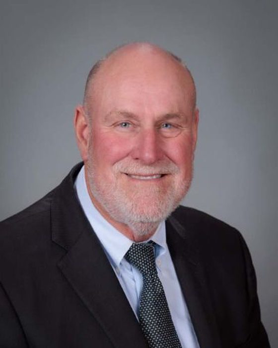 Portrait of Mark McElroy