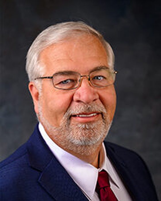 Portrait of Greg Elkins