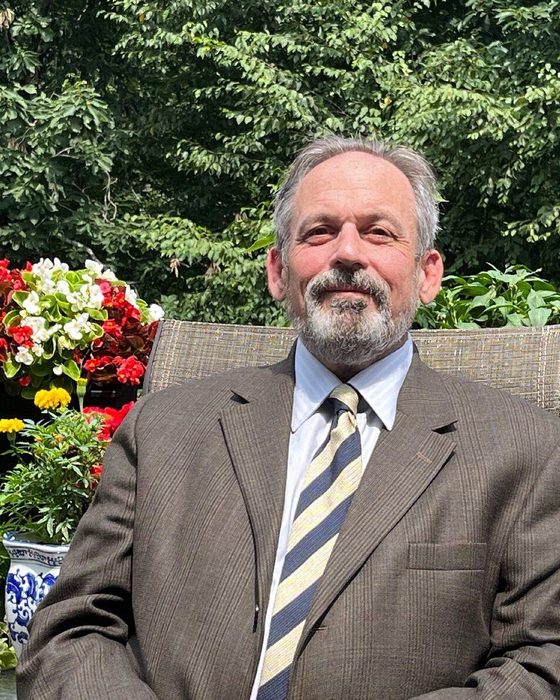 Portrait of John Schneller