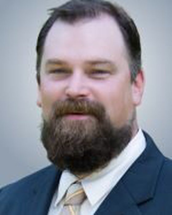 Portrait of Keith Ammon