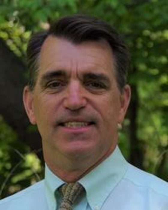 Portrait of Ned Raynolds