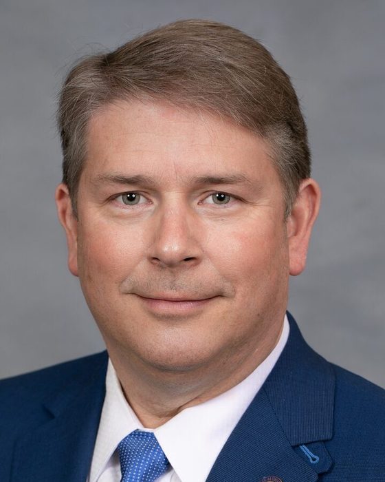 Portrait of Grey Mills