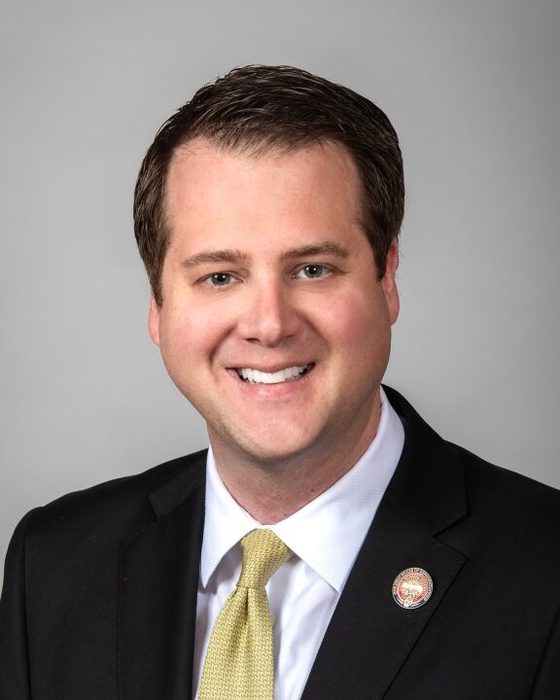 Portrait of Derek Merrin