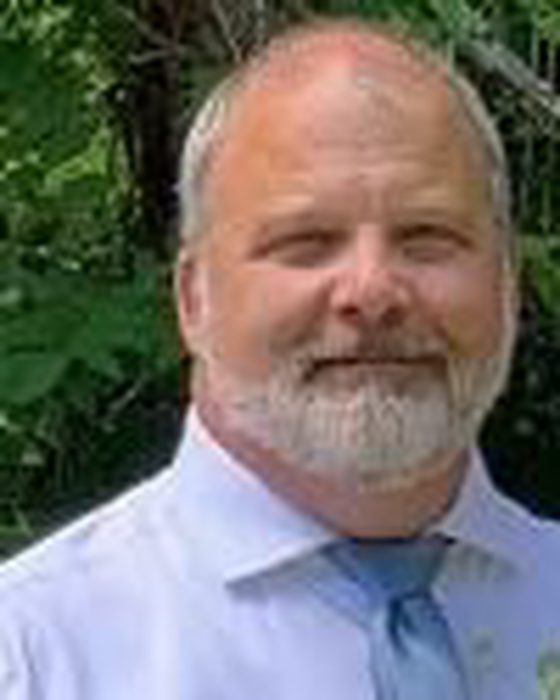 Portrait of Brian Adams