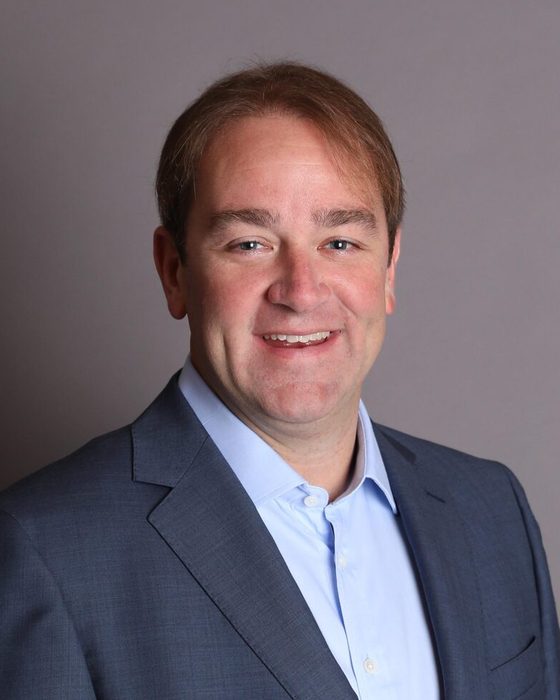 Portrait of John McQueeney