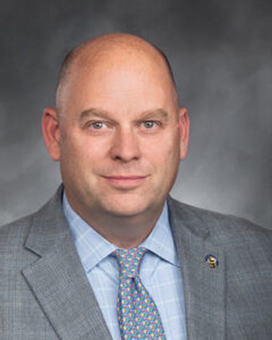 Portrait of Drew MacEwen