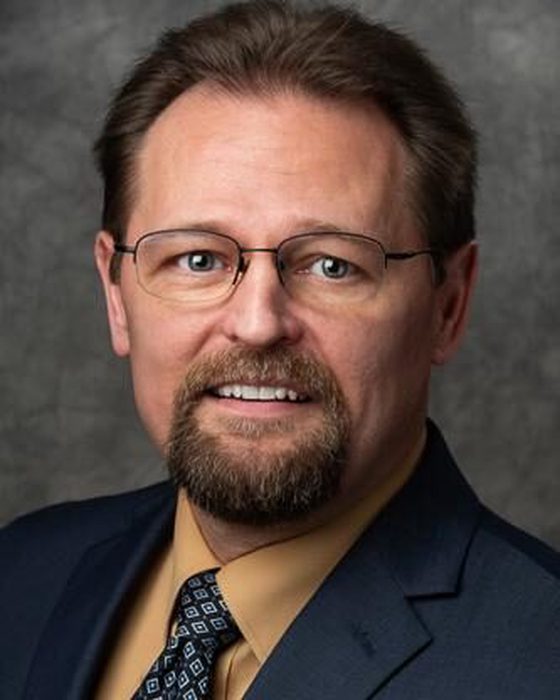 Portrait of Chris Phillips