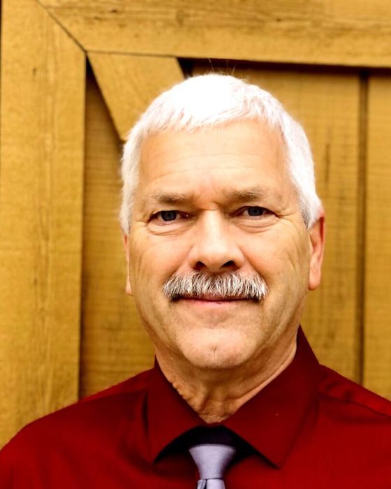 Portrait of JR Riggins